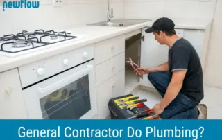 A general contractor works under a kitchen sink, showing an example related to the question of whether a general contractor can do plumbing.