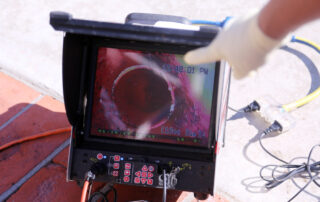 plumbers sewer snake camera. a snake camera checks the inside of a sewer drain to make sure its clear of blockage and or damage. plumber snake. snake camera.