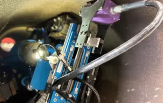 Robotic crawler sewer inspection camera inside a pipe capturing high-definition footage for plumbing inspection.